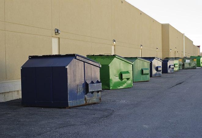 metallic dumpster units staged for construction garbage in Jersey City NJ